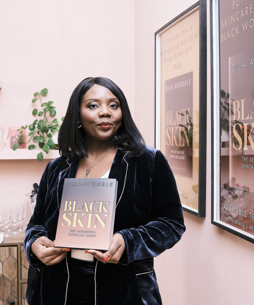 Dija Ayodele with her new book, Black skin.