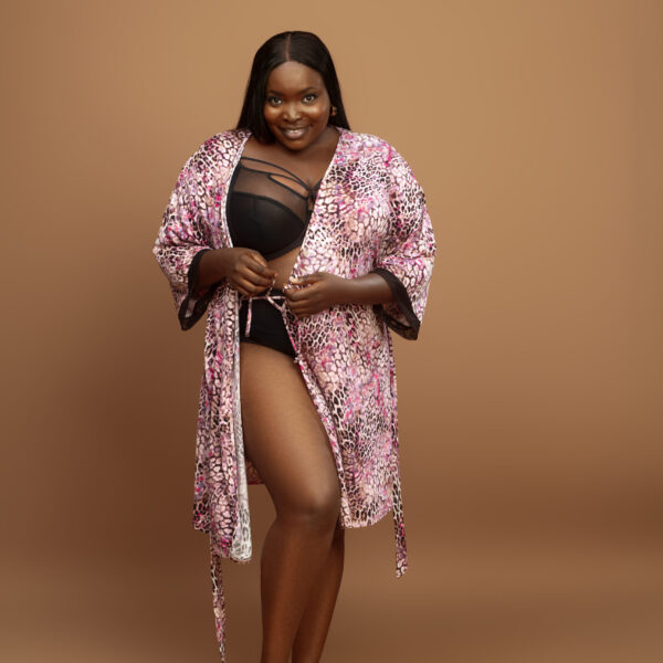 woman in Elomi Sachi Bra and Animal Skin Robe - Brief Essentials